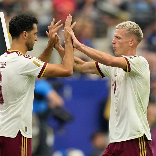 Spain's Dani Olmo, right, greets teammate Mikel Merino (6) as Olmo is replaced by Merino during the World Cup semifinal soccer match between France and Spain in Arlington, Texas, near Dallas, Tuesday, July 14, 2026. (AP Photo/Ashley Landis)
