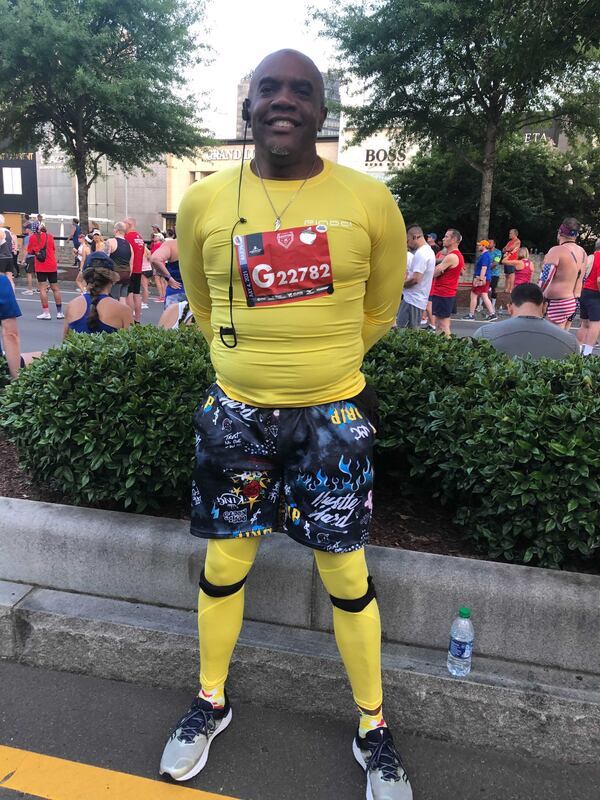 John Andrews, 55, of Atlanta on Sunday, July 4, 2021, at The Atlanta Journal-Constitution Peachtree Road Race. (Photo: Helena Oliviero/AJC)