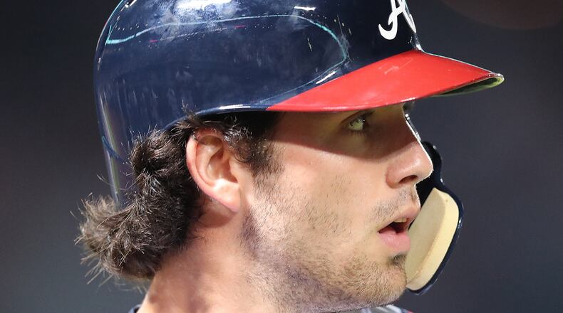 Braves shortstop Dansby Swanson has been out of the lineup two weeks with a strained side, but went 2-for-3 with a two-run homer in a minor league game as he nears return. (Curtis Compton/AJC file photo)