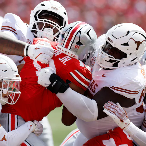FILE - Ohio State running back CJ Donaldson is stopped by the Texas defense during the second half of an NCAA college football game in Columbus, Ohio., Aug. 30, 2025. (AP Photo/Jay LaPrete, File)