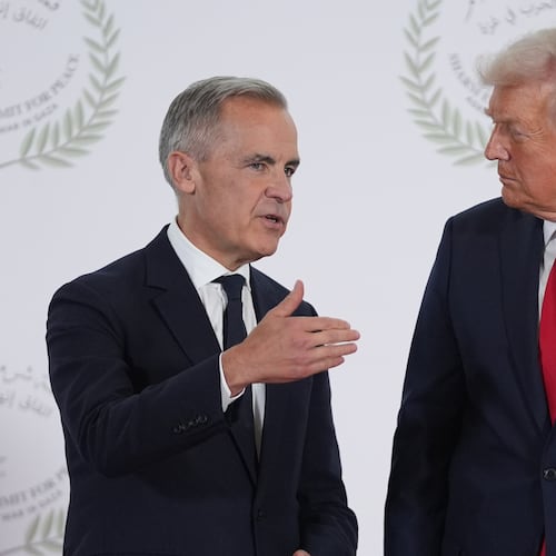 President Donald Trump greets Canada's Prime Minister Mark Carney during a summit to support ending the more than two-year Israel-Hamas war in Gaza after a breakthrough ceasefire deal, Monday, Oct. 13, 2025, in Sharm El Sheikh, Egypt. (AP Photo/Evan Vucci, Pool)