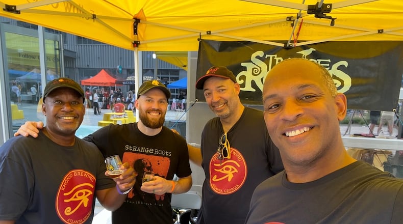 Kevin Downing of Khonso Brewing (from left) is seen with George Kepler of Strange Roots (a collaborating partner) and Corby Hannah and William Teasley of Khonso. (Courtesy of Khonso Brewing)