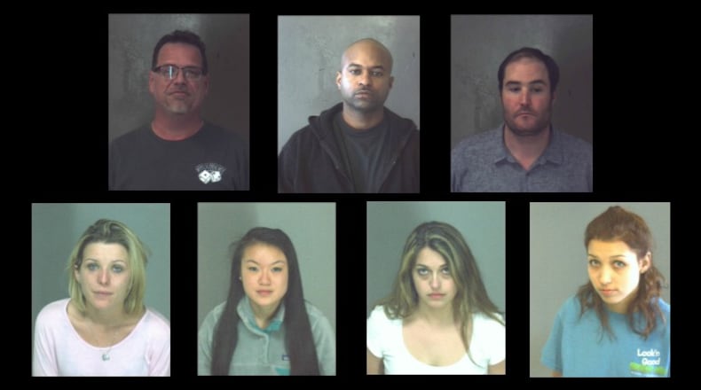 Top row (left to right): Sam Crenshaw, George Moore, Scott Phillips. Bottom row: Brittany Johnson, Esther Park, Laura Davis, Miranda Ogle (Credit: DeKalb County jail)