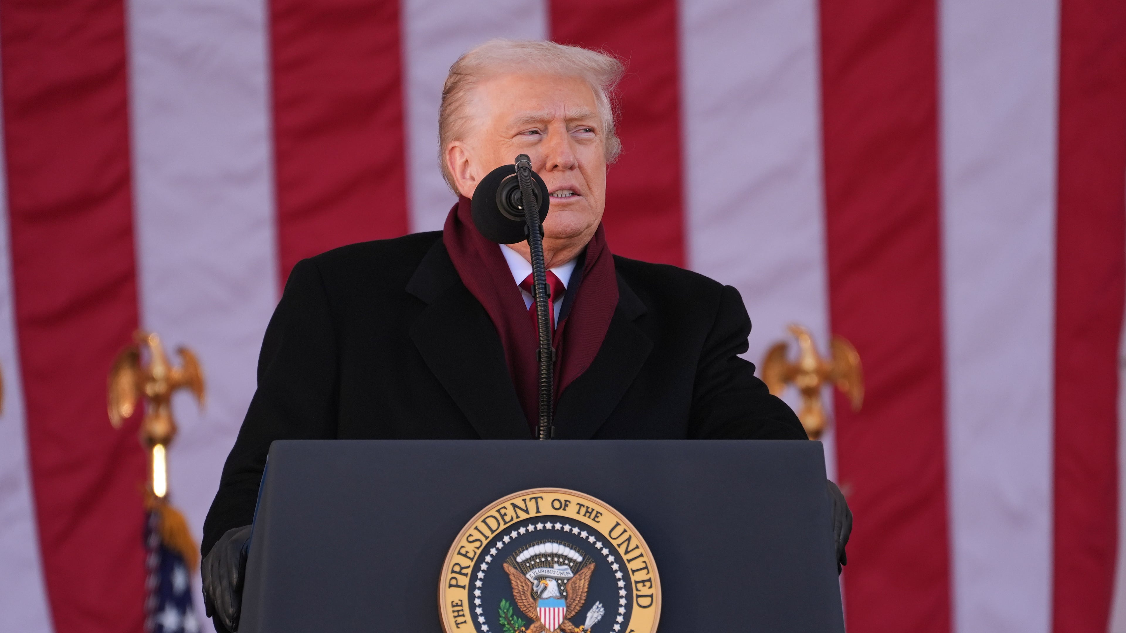 President Donald Trump speaks during an event to mark Veterans Day at Arlington National Cemetery, Tuesday, Nov. 11, 2025, in Arlington, Va. (AP Photo/Evan Vucci)