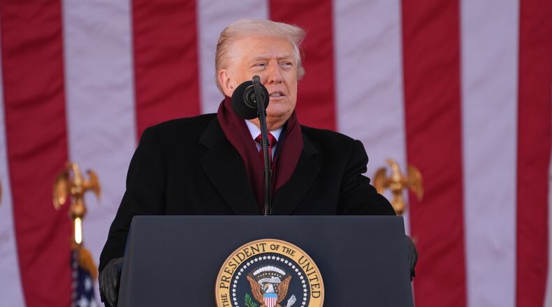 President Donald Trump speaks during an event to mark Veterans Day at Arlington National Cemetery, Tuesday, Nov. 11, 2025, in Arlington, Va. (AP Photo/Evan Vucci)