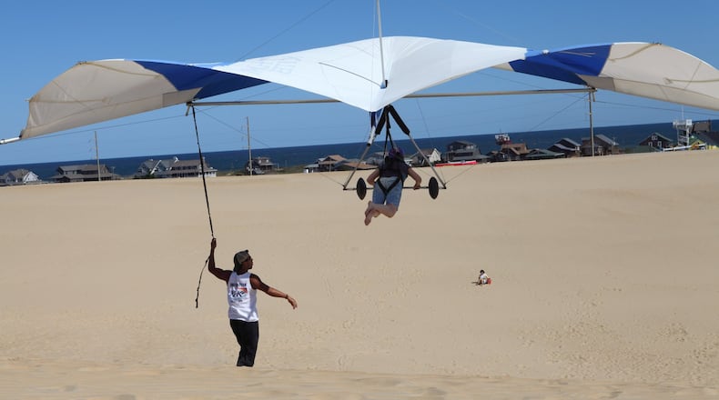 The sweeping sand dunes of Jockey’s Ridge State Park in Nags Head are the tallest in the eastern U.S. and offer an ideal spot for hang gliding. CONTRIBUTED BY: Visitnc.com