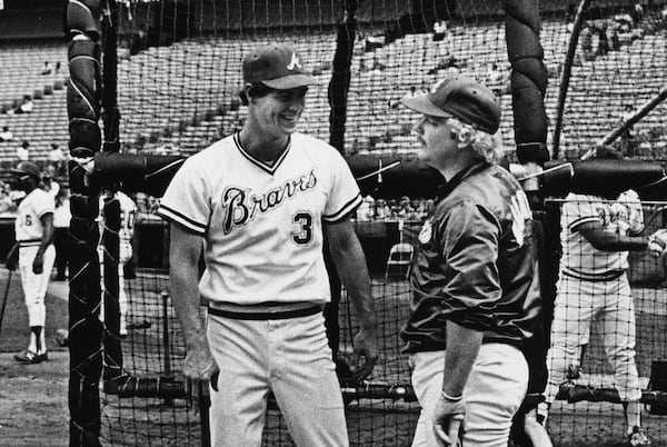 Dale Murphy (left) and teammate Bob Horner wait for their turns in the batting cage during the 1982 season. (AJC File)