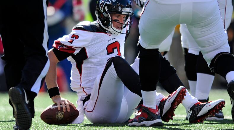 Atlanta Falcons quarterback Matt Ryan gets up after being sacked by Baltimore Ravens linebacker Pernell McPhee in the first half of an NFL football game, Sunday, Oct. 19, 2014, in Baltimore. (AP Photo/Gail Burton) Falcons quarterback Matt Ryan spent a lot of time in this position Sunday. (AP photo)