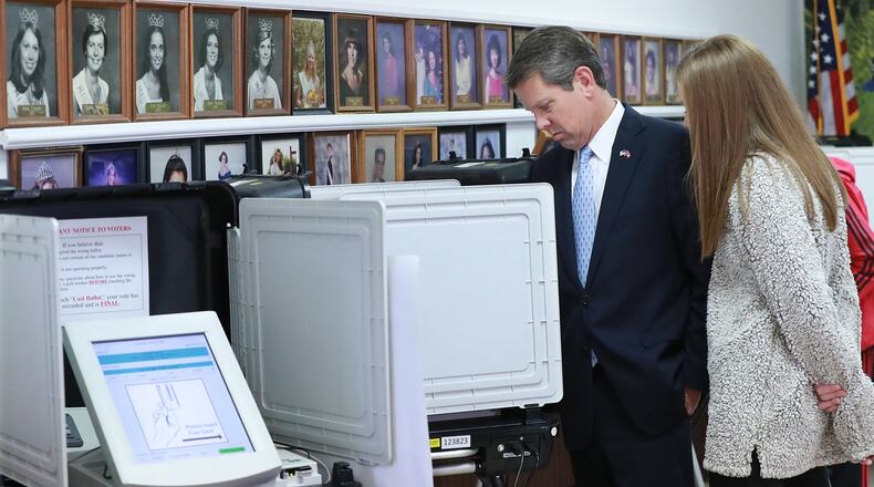 Nov 6, 2018 Winterville: Secretary of State Brian Kemp, Republican candidate for Georgia governor, with his daughter Amy Porter, casts his vote at the Winterville Train Depot on Tuesday, Nov. 6, 2018, in Winterville. Curtis Compton/ccompton@ajc.com