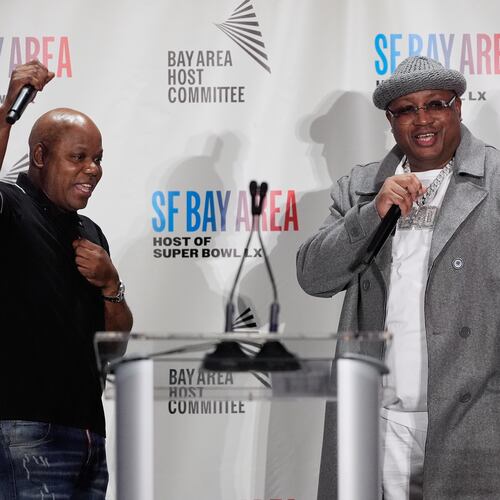 Rappers Too Short, left, and E-40 speak during a Bay Area Host Committee news conference for the NFL Super Bowl football game in San Francisco, Monday, Feb. 2, 2026. (AP Photo/Jeff Chiu)