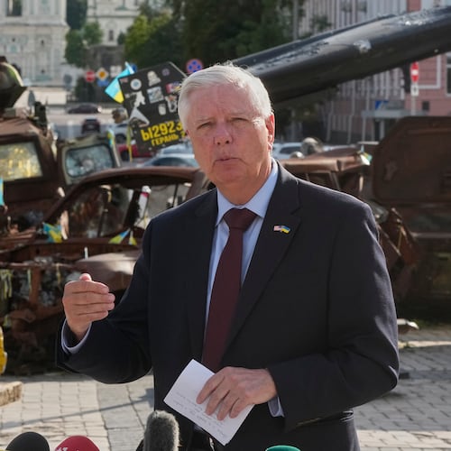 FILE - U.S. Sen. Lindsey Graham, R-S.C. answer media questions near damaged Russian vehicles exhibition in central Kyiv, on July 10, 2026. (AP Photo/Efrem Lukatsky, File)