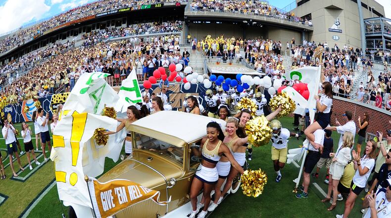 ATLANTA, GA - SEPTEMBER 12: Members of the Georgia Tech Yellow Jackets take the field before the game against the Tulane Green Wave on September 12, 2015 in Atlanta, Georgia. Photo by Scott Cunningham/Getty Images)