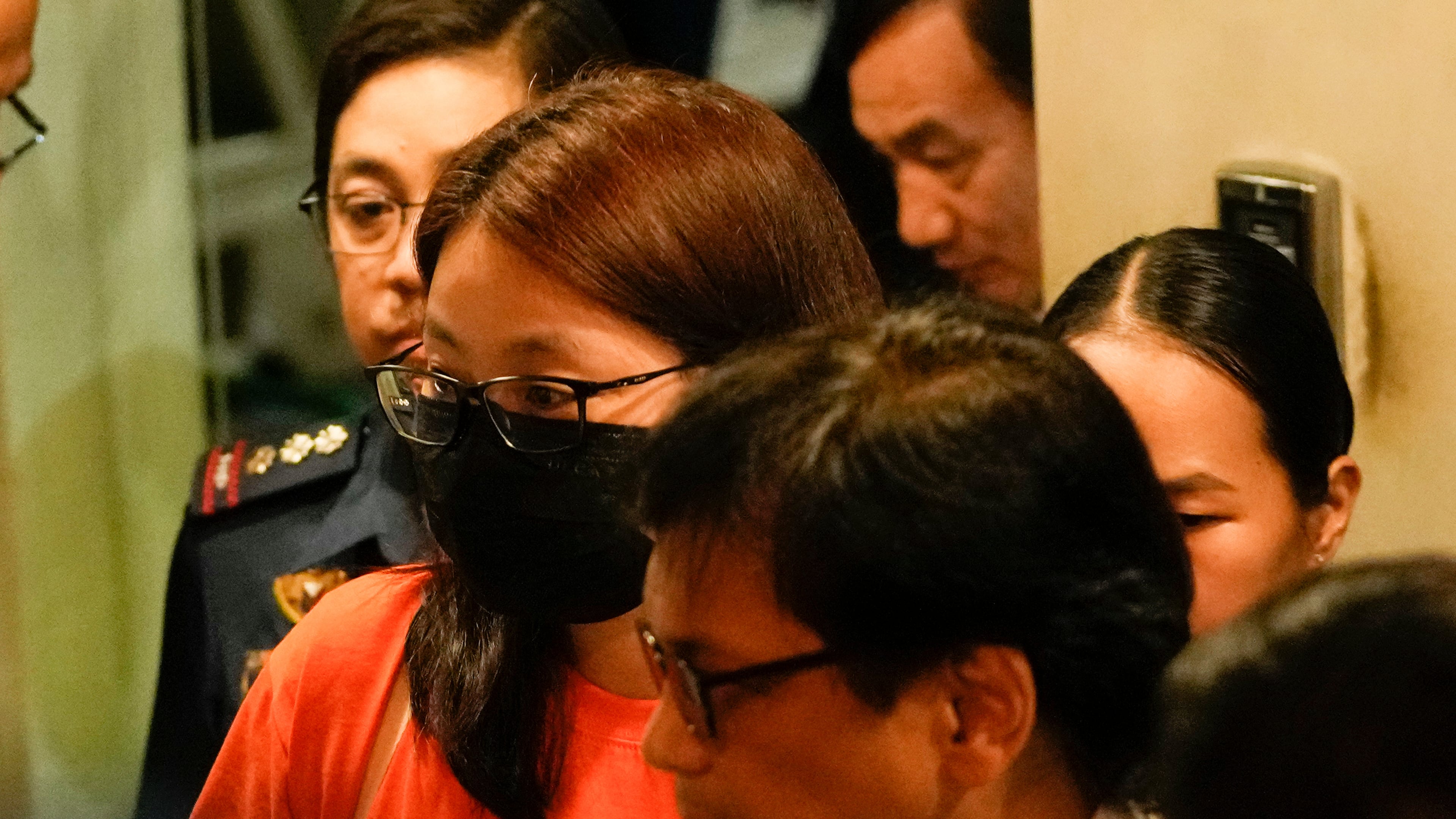 FILE -Dismissed Bamban town Mayor Alice Guo arrives at a private hangar in the City of Pasay, Philippines, early Sept. 6, 2024, following her deportation from Indonesia. (AP Photo/Aaron Favila, File)