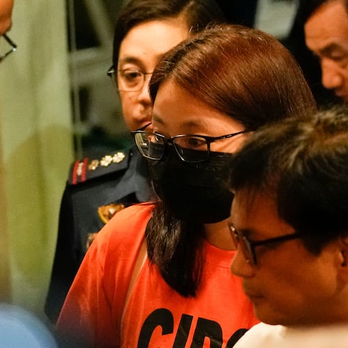 FILE -Dismissed Bamban town Mayor Alice Guo arrives at a private hangar in the City of Pasay, Philippines, early Sept. 6, 2024, following her deportation from Indonesia. (AP Photo/Aaron Favila, File)