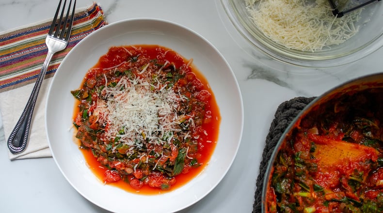 Collard Greens with Tomato Parmesan Gravy.
(Virginia Willis for The Atlanta Journal-Constitution)