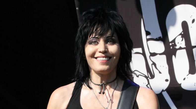 #11 of #19. PLEASE KEEP IN SEQUENTIAL ORDER FOR THE CONTINUITY OF THE GALLERY. -Day #1 of Music Midtown 2012 featured 40,000 sundrenched fans enjoying the Piedmont Park vibes of Foo Fighters, The Avett Brothers, T.I., Joan Jett & the Blackhearts and Van Hunt. Pictured is Joan Jett performing "Cherry Bomb." Robb D. Cohen /www.RobbsPhotos.com