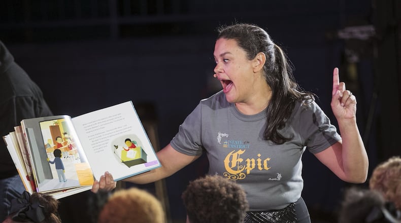 Atlanta Public Schools Superintendent Meria Carstarphen reads to students as she closes out her final State of the District address at the newly renovated Harper-Archer Elementary School. AJC file photo BOB ANDRES / ROBERT.ANDRES@AJC.COM