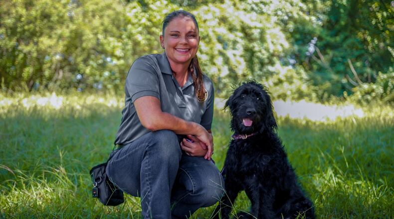 Handler Mandy Kimner and Asher trained for months to be ready to assist crime victims, attend community events and respond to emergencies.