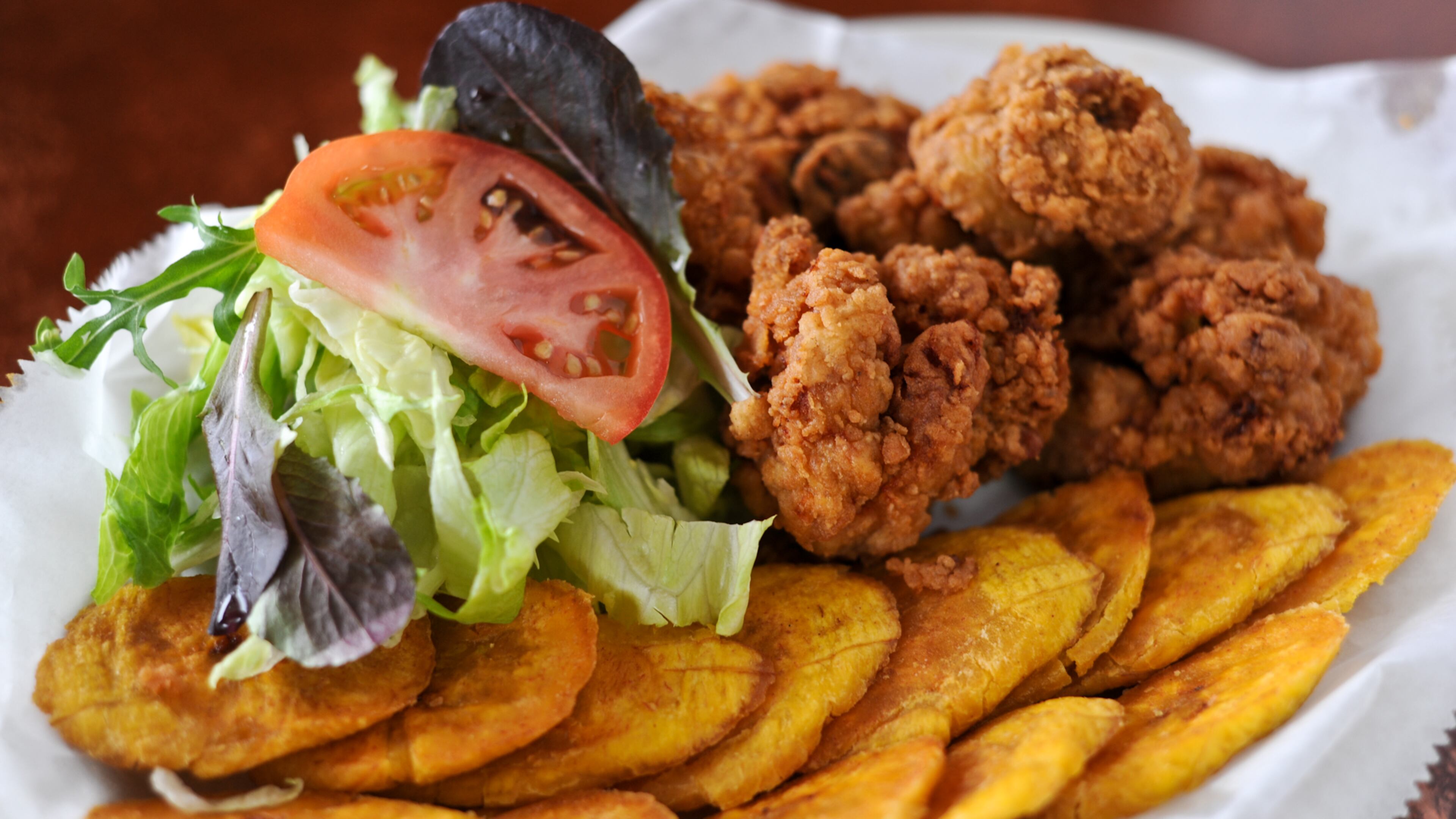 Be sure to try the fried chicken with plantains at Cafe Dominicano.