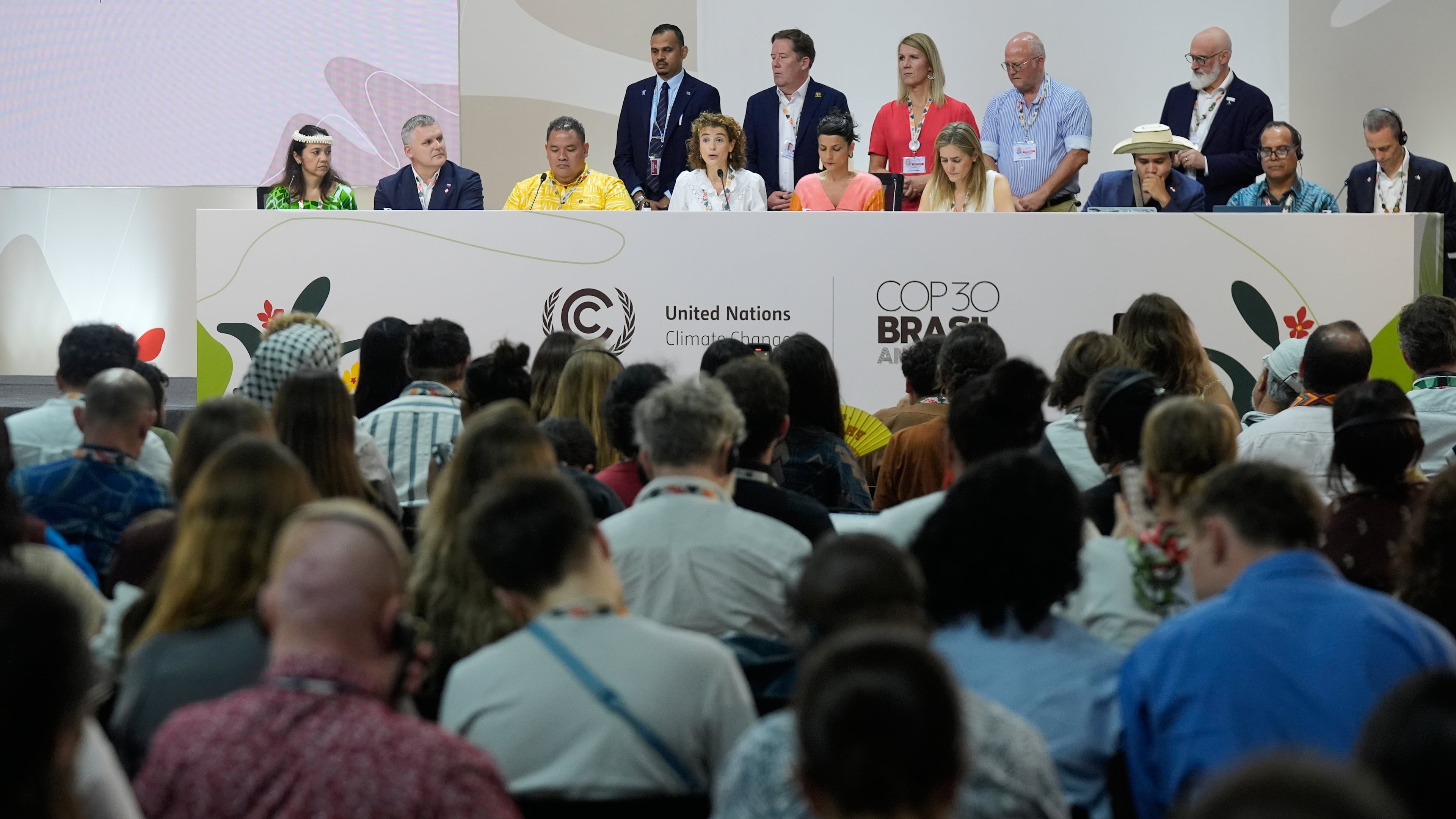 Sophia Hermans, deputy prime minister of the Netherlands, fourth from left sitting, speaks during a session surrounded by other countries at the COP30 U.N. Climate Summit, Friday, Nov. 21, 2025, in Belem, Brazil. (AP Photo/Fernando Llano)
