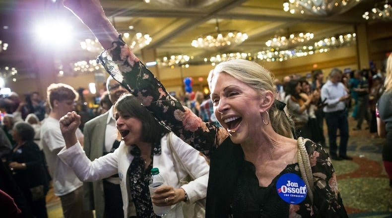 Supporters of Democratic candidate for Georgia's Sixth Congressional Seat Jon Ossoff, who is running to replace former U.S. Rep. Tom Price, react to polling results during an election party, Tuesday, April 18, 2017, in Atlanta. BRANDEN CAMP/SPECIAL