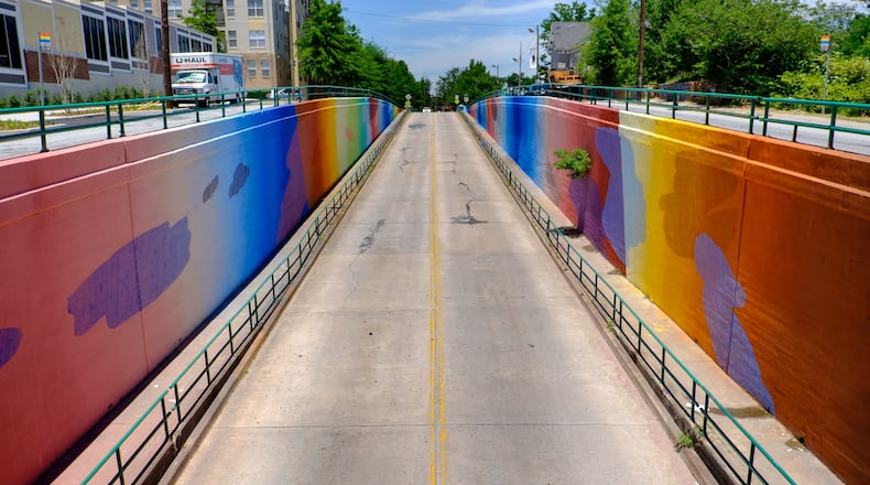 Living Walls Photography By Joshua Gwyn Last year Atlanta-based public art organization Living Walls recruited New Orleans artist MOMO and 50 volunteers to paint the Boulevard underpass. The mural has now been included in the Google Street Art Project.