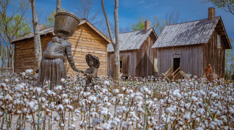 Ghanian artist Kwame Akoto-Bamfo’s figurative groupings at Freedom Monument Sculpture Park chronicle the arrival of a family of enslaved people who have just arrived in the Americas. The family is later depicted working in the cotton fields where a young child has pricked a finger on the sharp cotton bolls. Courtesy of Equal Justice Initiative ∕ Human Pictures