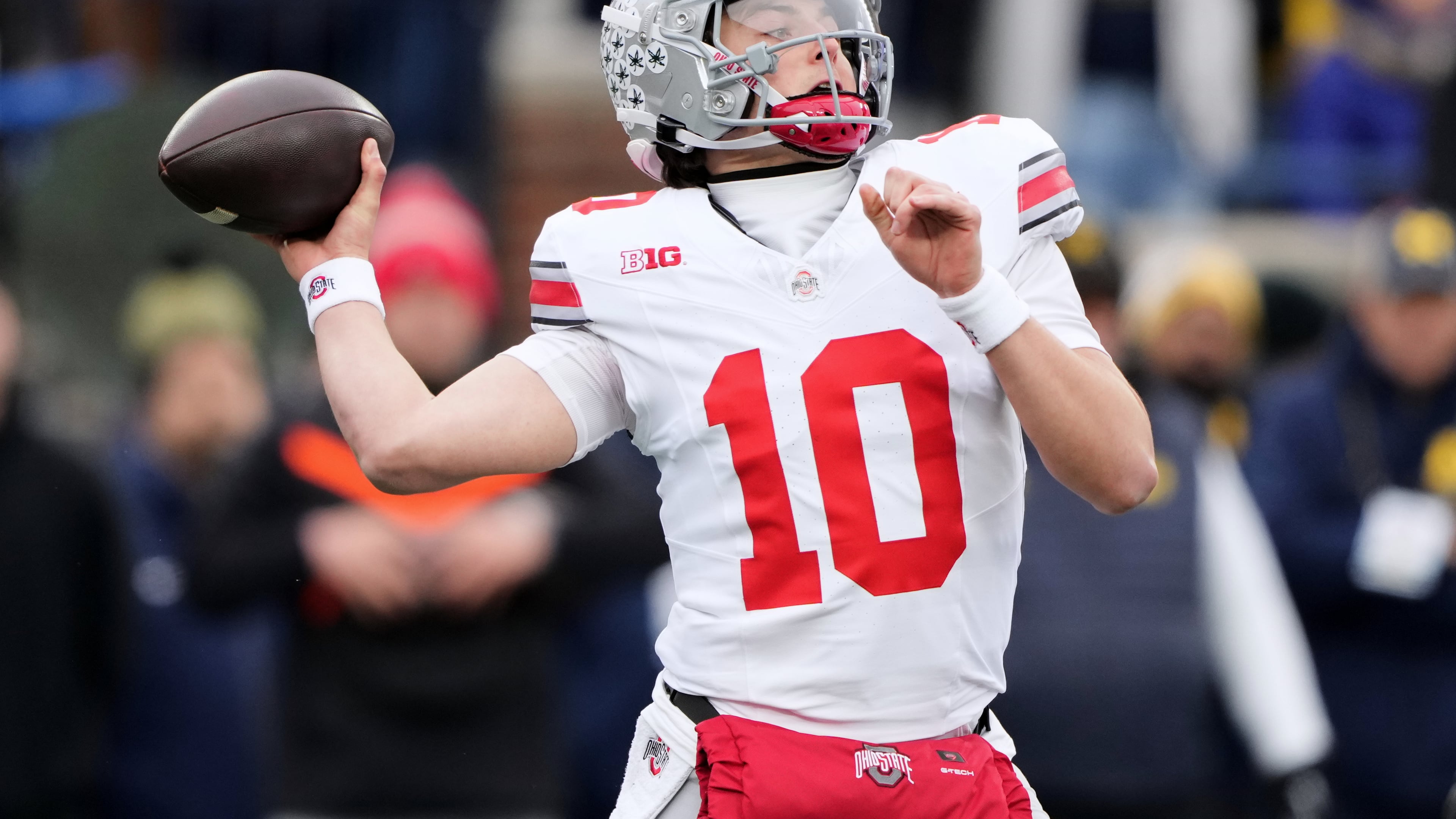 Ohio State quarterback Julian Sayin throws during the first half of an NCAA college football game against Michigan, Saturday, Nov. 29, 2025, in Ann Arbor, Mich. (AP Photo/Ryan Sun)