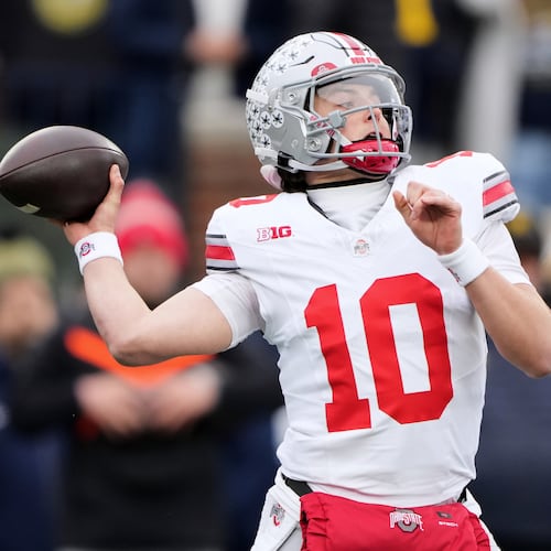 Ohio State quarterback Julian Sayin throws during the first half of an NCAA college football game against Michigan, Saturday, Nov. 29, 2025, in Ann Arbor, Mich. (AP Photo/Ryan Sun)