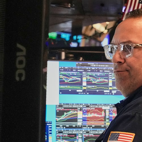 Specialist Anthony Matesic works at his post on the floor of the New York Stock Exchange, Thursday, April 30, 2026. (AP Photo/Richard Drew)