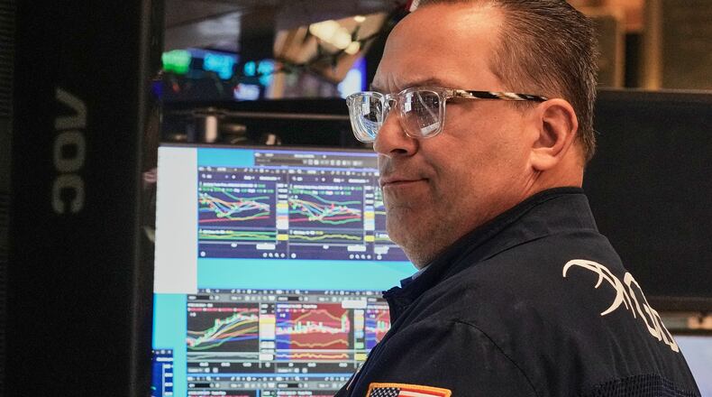 Specialist Anthony Matesic works at his post on the floor of the New York Stock Exchange, Thursday, April 30, 2026. (AP Photo/Richard Drew)