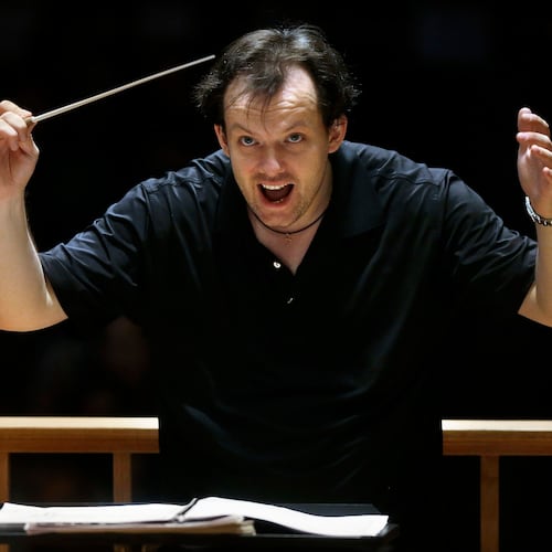 FILE - Boston Symphony Orchestra music director Andris Nelsons rehearses with the orchestra at Symphony Hall, Nov. 20, 2014, in Boston. (AP Photo/Steven Senne, File)