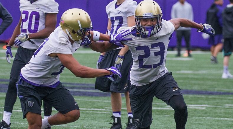 Cornerback Jordan Miller runs a drill during the University of Washington’s first spring football practice at Husky Stadium on Monday March 27, 2017. (Mike Siegel/The Seattle Times)