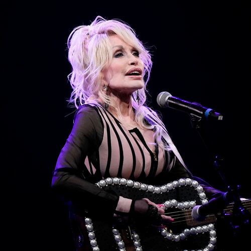 FILE - Dolly Parton performs in Overland Park, Kan., on Aug. 14, 2023. (AP Photo/Charlie Riedel, File)