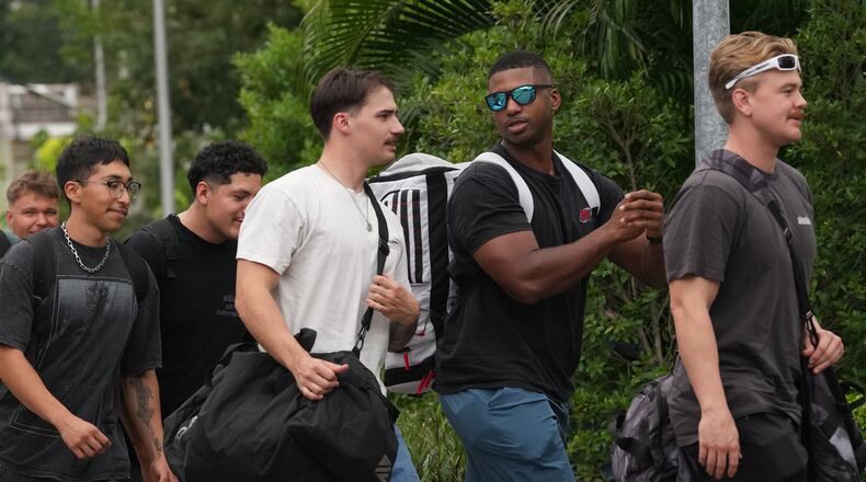 American service members from the USS Abraham Lincoln strike group arrive at a hotel in Pattaya, Thailand, Wednesday, Sept. 2, 2026. (AP Photo/Sakchai Lalit)