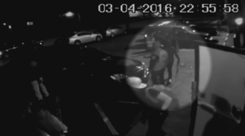 Atlanta rapper Bankroll Fresh, whose real name was Trentavious White, is seen on surveillance video holding an assault rifle. (Credit: Channel 2 Action News)