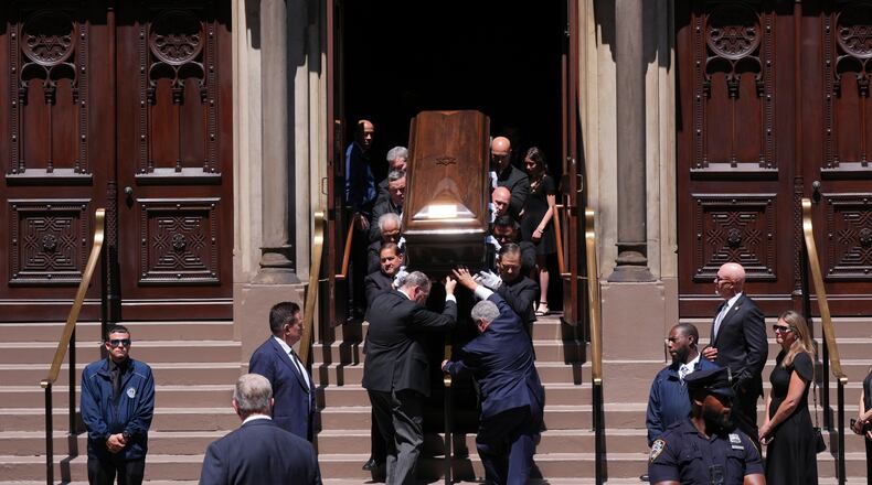 Pallbearers carry the casket after funeral services for Clive Davis at Central Synagogue in New York, Monday, June 29, 2026. (AP Photo/Adam Gray)