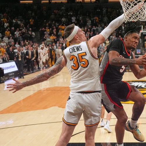 Georgia’s Jeremiah Wilkinson (right) heads to the basket as Missouri’s Jacob Crews defends on Tuesday, Jan. 20, 2026, in Columbia, Mo. The No. 21-ranked Bulldogs pulled out a 74-72 win at Mizzou Arena. (Jeff Roberson/AP)