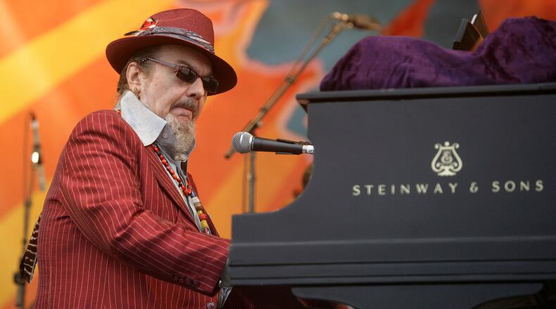 FILE - In this April 26, 2008 file photo, Dr. John performs during the 2008 New Orleans Jazz & Heritage Festival in New Orleans. The family of the Louisiana-born musician known as Dr. John says the celebrated singer and piano player who blended black and white musical influence with a hoodoo-infused stage persona and gravelly bayou drawl, has died. He was 77. A family statement released by his publicist says Dr. John, who was born Mac Rebennack, died early Thursday of a heart attack.