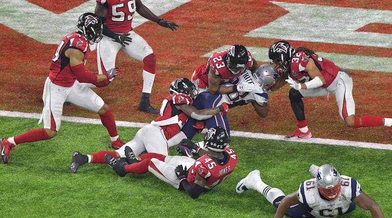 New England Patriots running back James White (28) dives for the game winning touchdown in the 5th quarter at NRG Stadium in Houston, TX, on Sunday, February 5, 2017. HYOSUB SHIN / HSHIN@AJC.COM