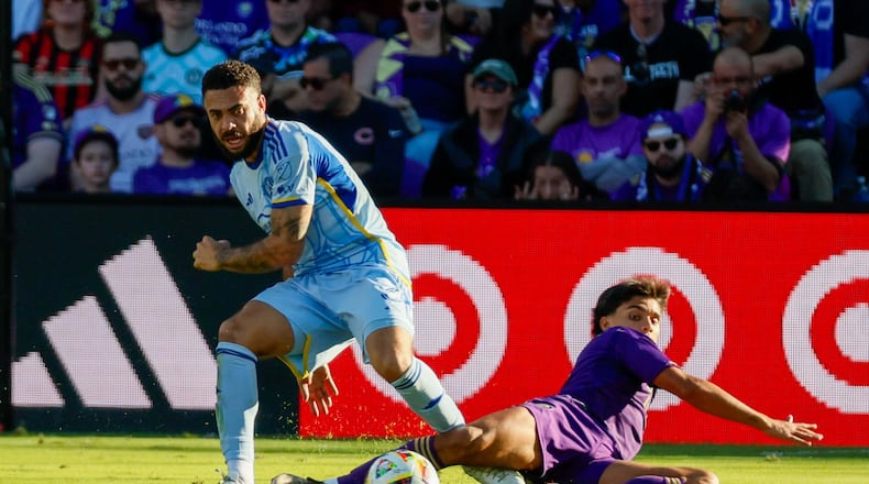 Atlanta United defender Derrick Williams (3) disputes the ball agains Orlando City forward Ramiro Enrique (7) during the first half in the MLS Eastern Conference Semifinal playoff match on Sunday, Nov. 24, 2024, in Orlando.
(Miguel Martinez/ AJC)