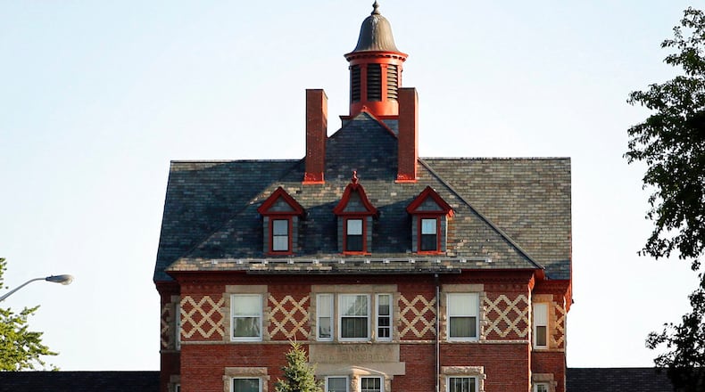 FILE - This July 30, 2018 file photo shows the Dorothea Dix Psychiatric Center, formerly known as Bangor Mental Health Institute in Bangor, Maine. A Florida-based health care company that could receive a $60.3 million state contract to run a 21-bed Maine residence for some psychiatric patients is fighting to keep its proposal secret. (AP Photo/Robert F. Bukaty, File)