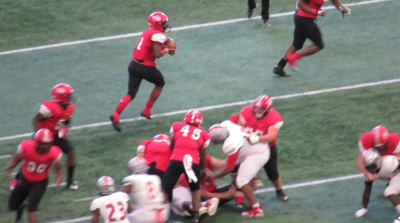 Clinch County Panthers Tyler Morehead scrambles outside of the pocket during the GHSA Class A-Public championship game on Wednesday, Dec. 11, 2018 at Mercedes-Benz Stadium in Atlanta. (Adam Krohn/special)