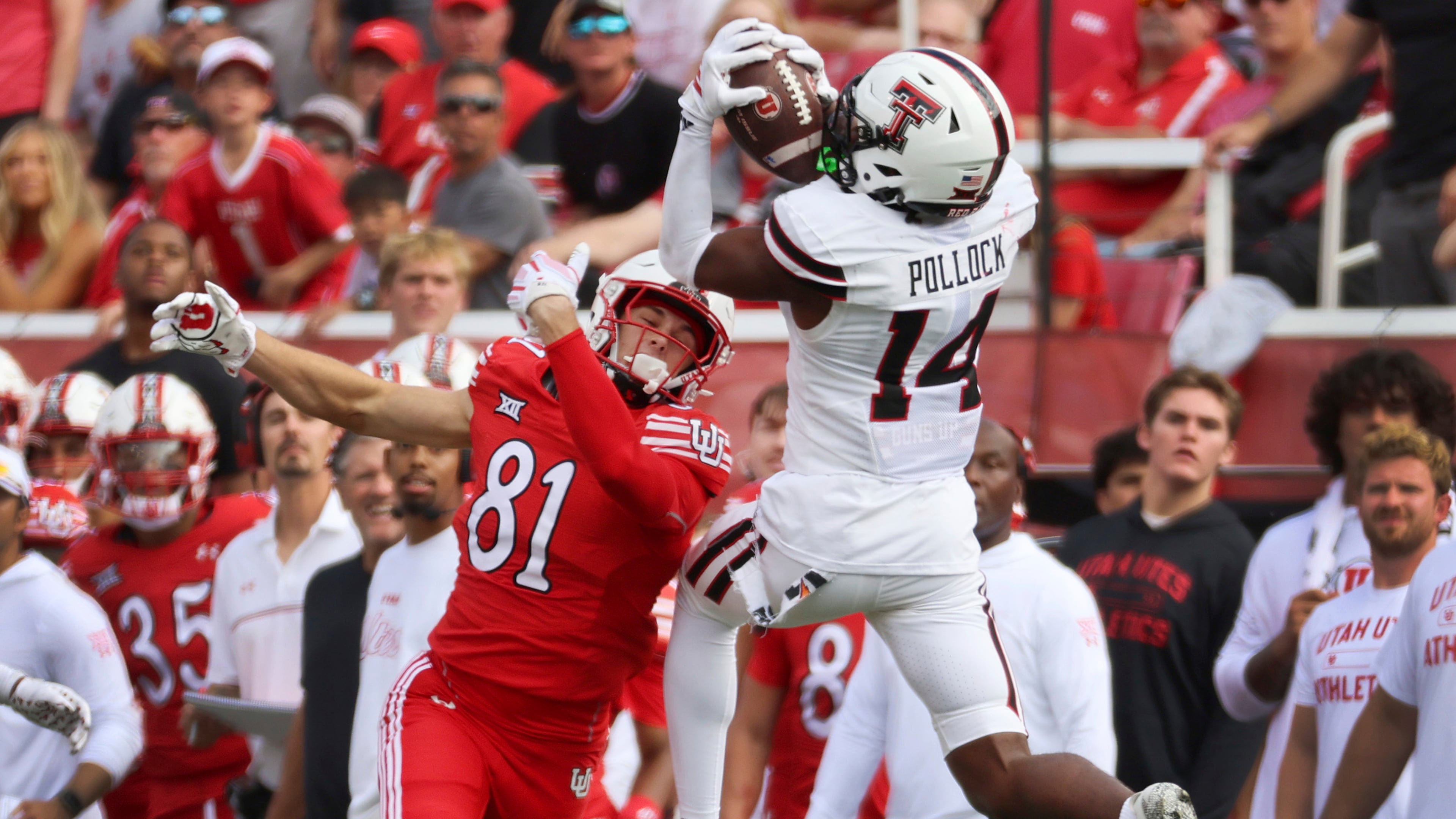 Texas Tech defensive back Brice Pollock intercepts a pass intended for Utah tight end JJ Buchanan during the first half of an NCAA college football game Saturday, Sept. 20, 2025, in Salt Lake City, Utah. (AP Photo/Jeffrey D. Allred)