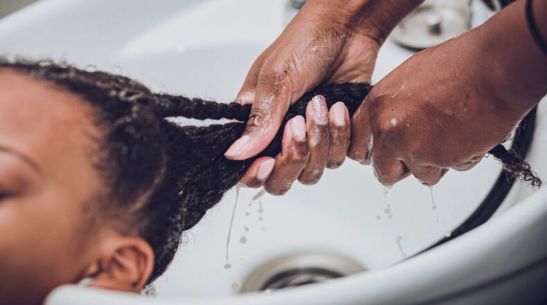 "Wash Day (Kameron)" by Tomesha Faxio.
Courtesy of Mint Gallery