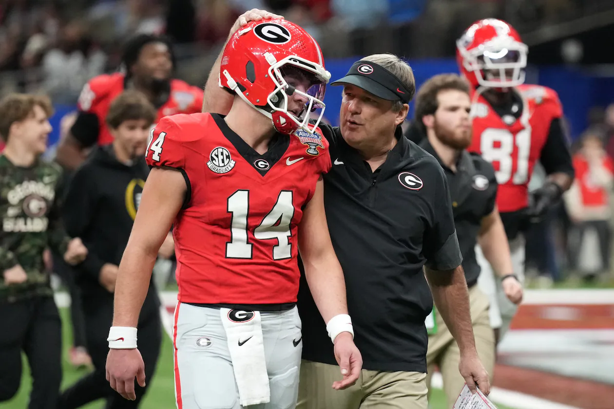 Georgia head coach Kirby Smart (right) speaks to quarterback Gunner Stockton before the Sugar Bowl game against Mississippi, Thursday, Jan. 1, 2026, in New Orleans. (Matthew Hinton Hinton/AP)