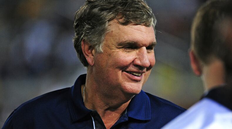 ATLANTA, GA - SEPTEMBER 3: Head Coach Paul Johnson of the Georgia Tech Yellow Jackets chats with players late in the game against the Alcorn State Braves on September 3, 2015 in Atlanta, Georgia. Photo by Scott Cunningham/Getty Images)