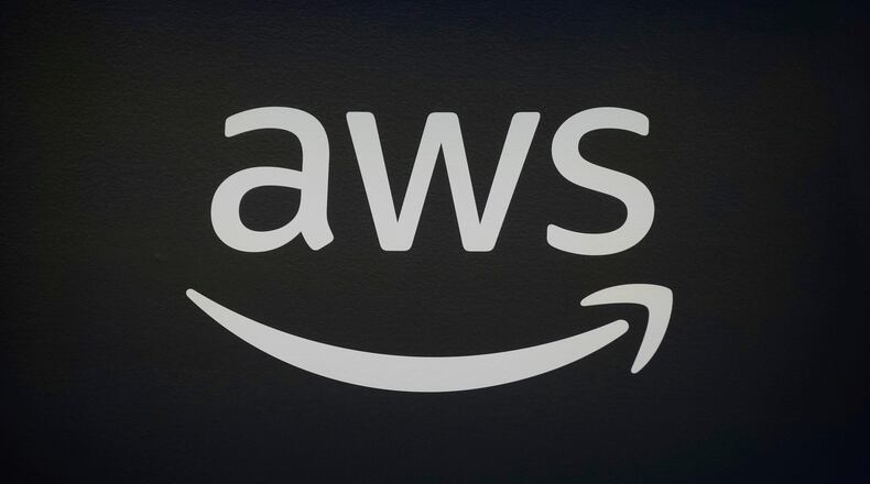 FILE - An AWS, Amazon Web Services, logo is displayed at LlamaCon 2025, an AI developer conference, in Menlo Park, Calif., Tuesday, April 29, 2025. (AP Photo/Jeff Chiu, File)
