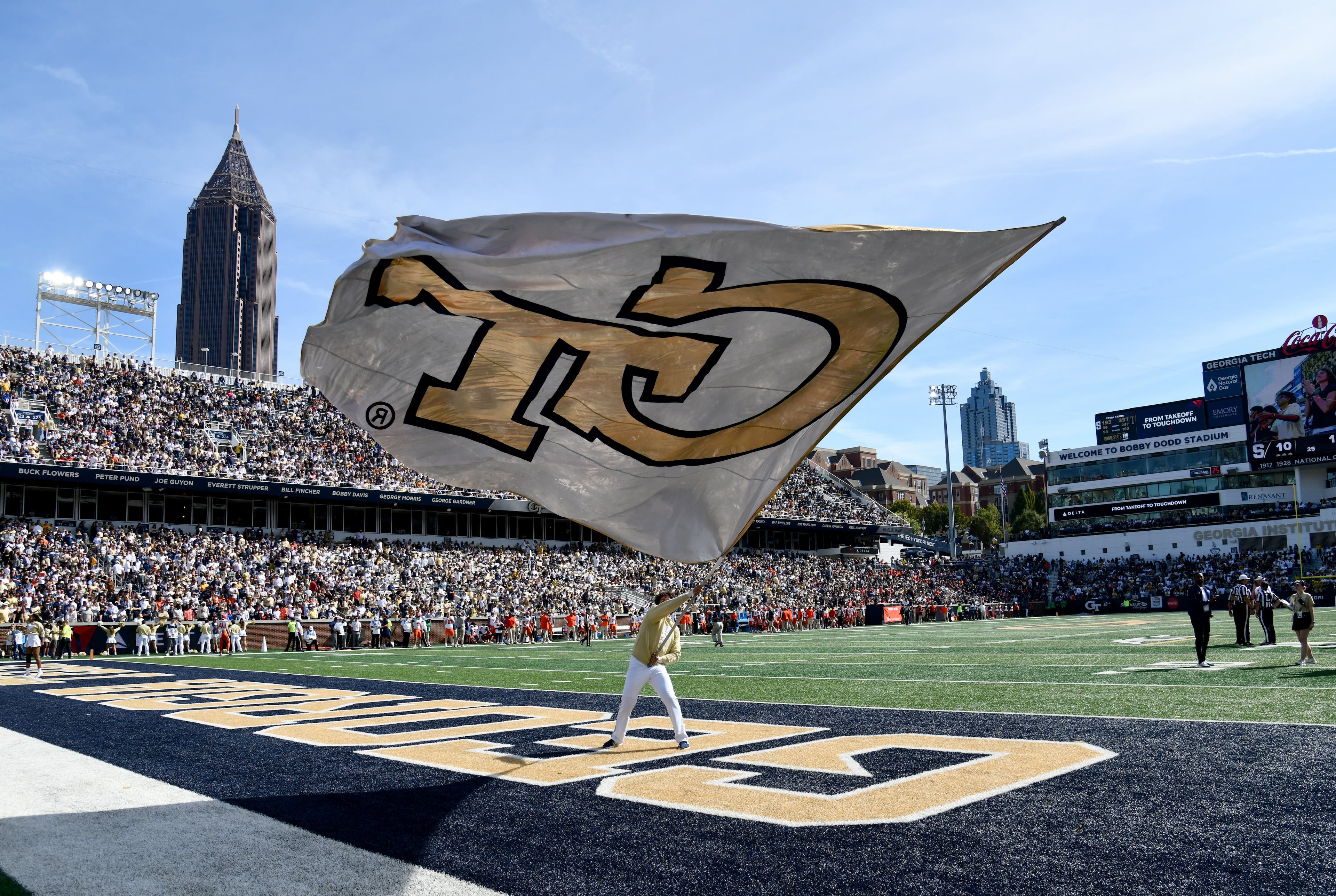 Georgia Tech fans celebrate after scoring during the second half in an NCAA college football game at Bobby Dodd Stadium, Saturday, Oct. 25, 2025 in Atlanta. Georgia Tech won 41-16 over Syracuse. The Yellow Jackets are 8-0 for the first time since 1966 and 5-0 in the ACC for the first time ever. (Hyosub Shin/AJC)