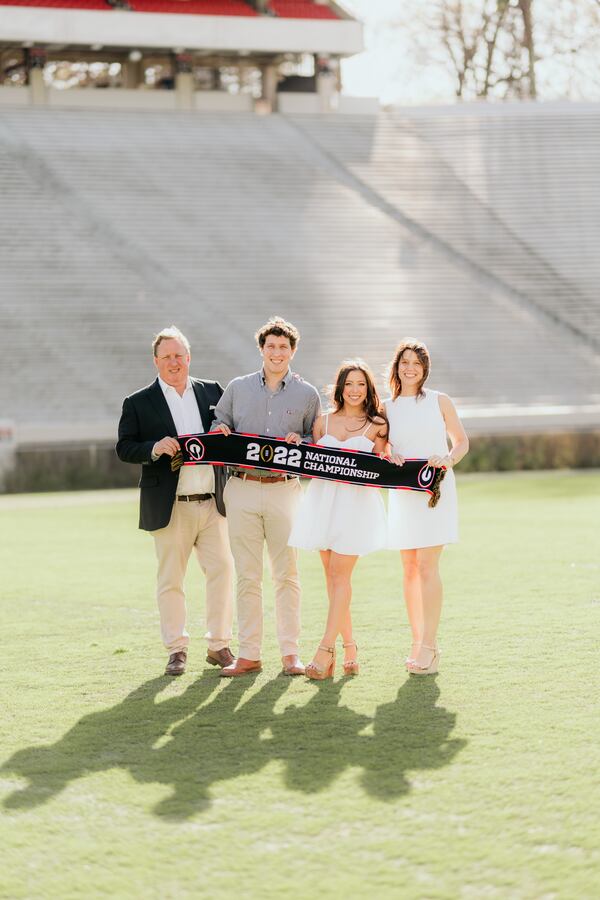 The Satisky family at daughter Aly's graduation in May 2022.
